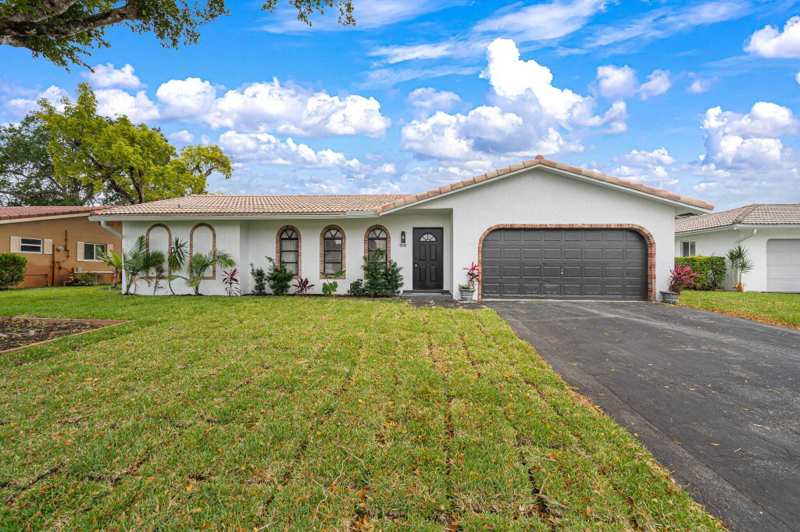 4 bedroom Single Family Residence at 8548 NW 24th Court, Forest Hills South, Coral Springs — photo 1