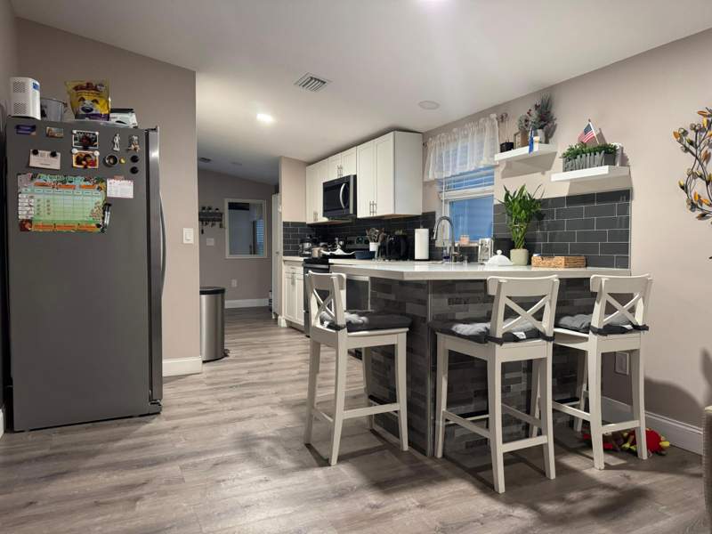 4 bedroom Mobile Home at 3899 Redman Parkway #143, Whispering Pines, Boynton Beach — photo 5