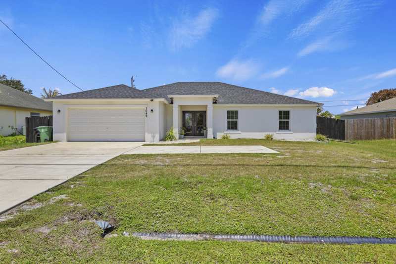 4 bedroom Single Family Residence at 1049 SW Paar Drive, Port St Lucie Section 19, Port St. Lucie — photo 1