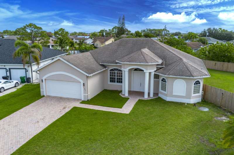 4 bedroom Single Family Residence at 2301 SW Vale, Port St Lucie Section 35, Port St. Lucie — photo 1