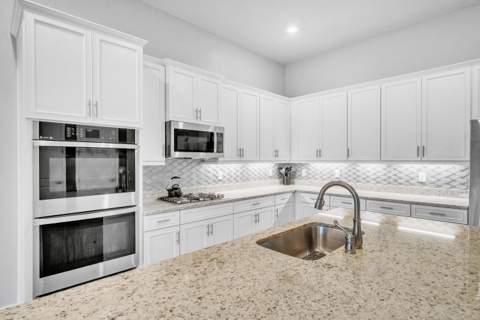 7524 N Blue Spring Drive, Parkland FL - photo 12 of 73