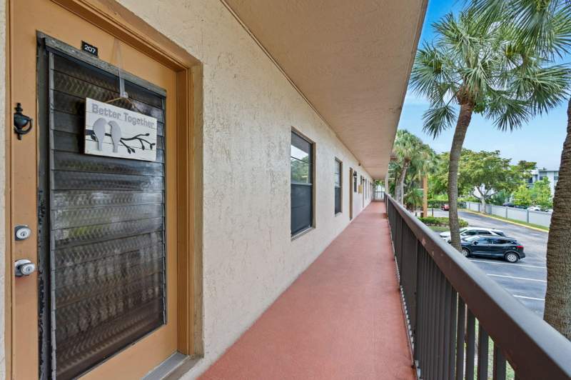 2 bedroom Condominium at 6095 N Sabal Palm Boulevard #207, Lakes Of Carriage Hills, Tamarac — photo 2
