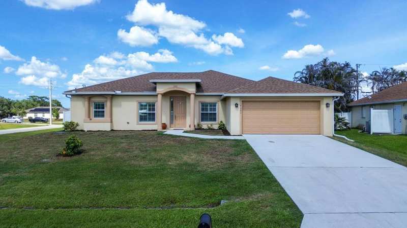4 bedroom Single Family Residence at 4201 SW Mcclellen Street, Port St Lucie Section 33, Port St. Lucie — photo 1