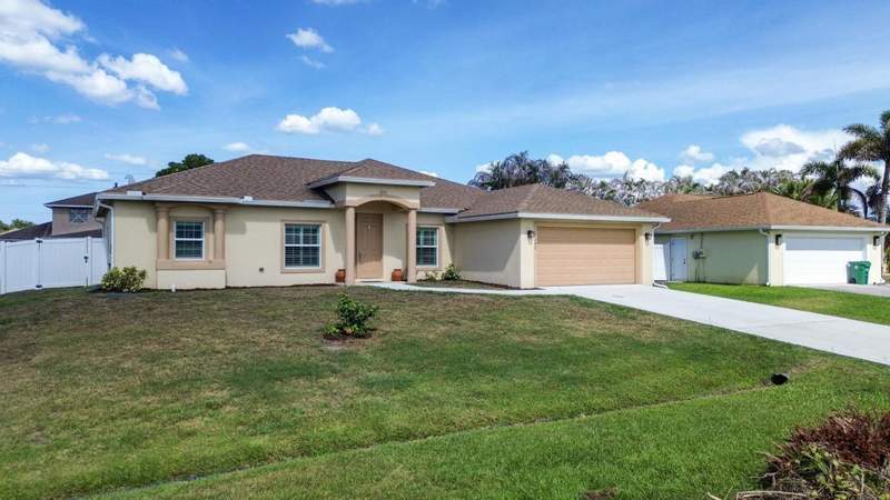 4 bedroom Single Family Residence at 4201 SW Mcclellen Street, Port St Lucie Section 33, Port St. Lucie — photo 4