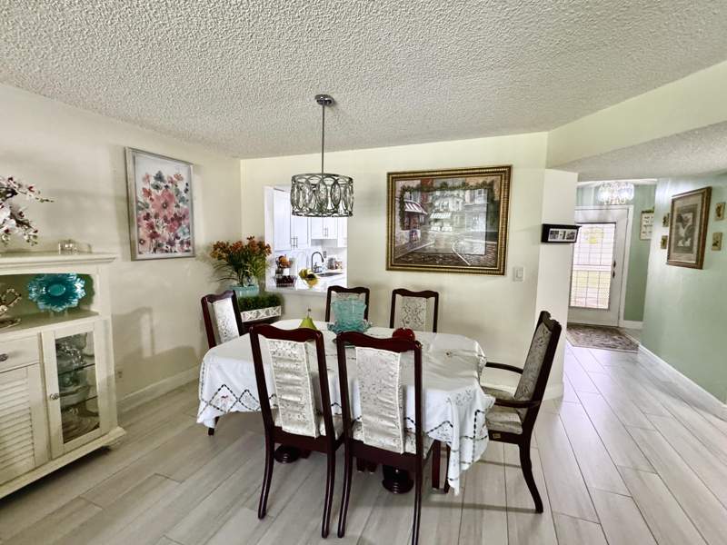 2 bedroom Condominium at 4930 E Sabal Palm Boulevard #107, Lakes Of Carriage Hills, Tamarac — photo 5