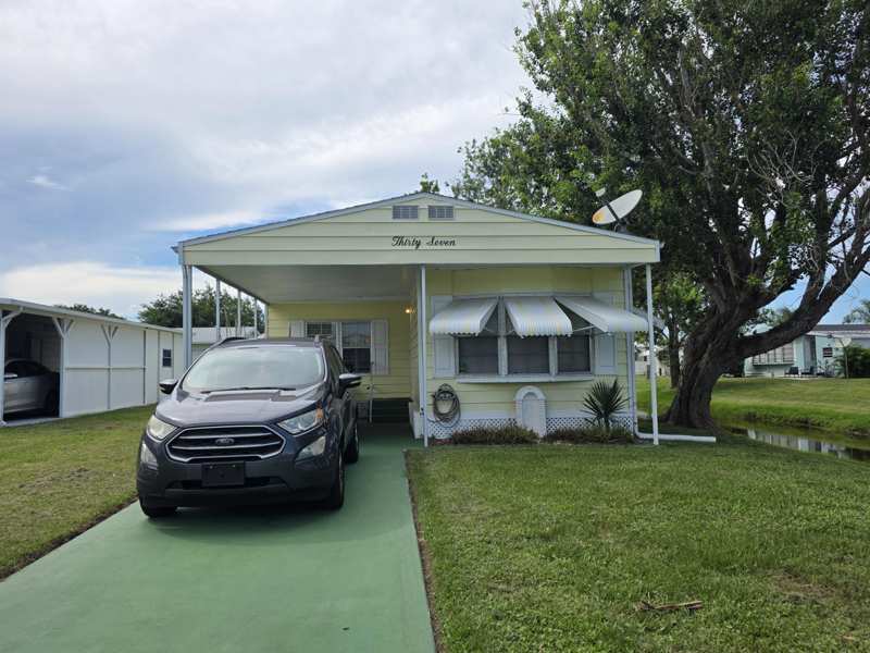 2 bedroom Manufactured Home at 37 Los Lagos Road, Spanish Lakes Riverfront, Port St. Lucie — photo 1