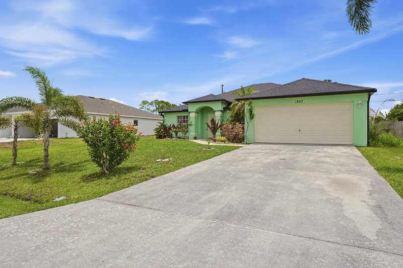 4 bedroom Single Family Residence at 1842 SW Penrose Avenue, Port St Lucie Section 19, Port St. Lucie — photo 1