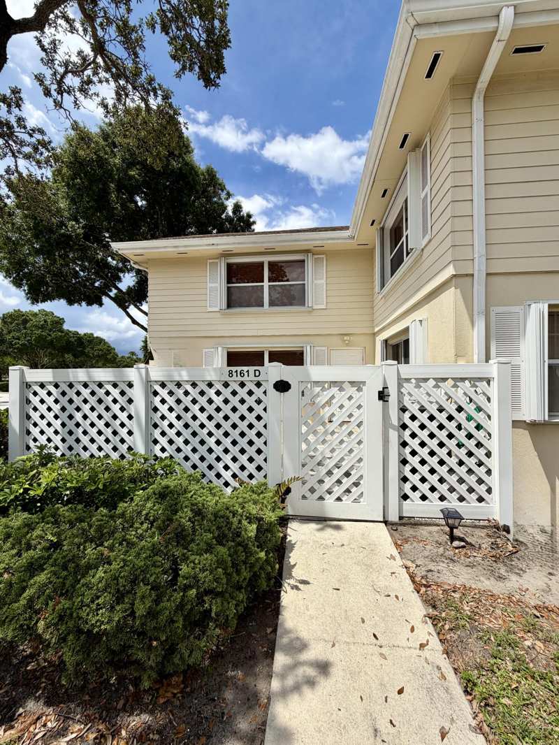 2 bedroom Townhouse at 8161 Andover Court #61d, Wellesley At Lake Clarke Shores, Lake Clarke Shores — photo 1
