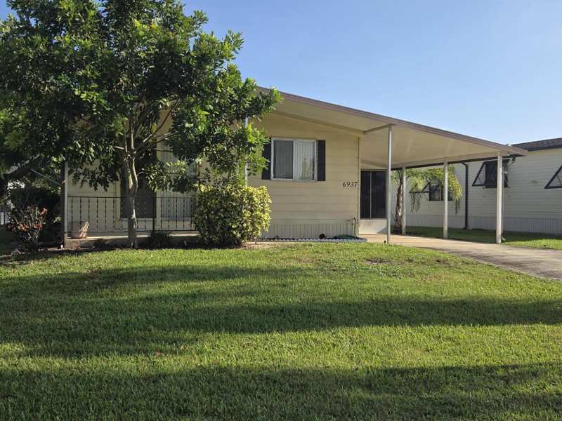 2 bedroom Manufactured Home at 6937 SE Delegate Street, Cambridge At Heritage Ridge, Hobe Sound — photo 1
