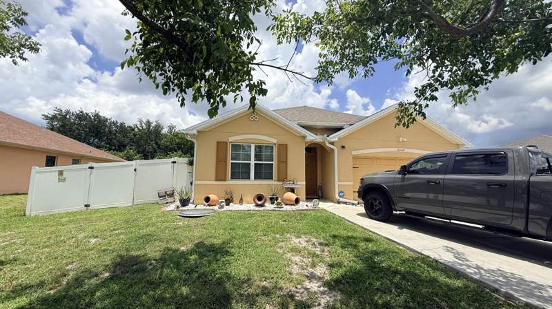 4 bedroom Single Family Residence at 2369 SW Barber Lane, Port St Lucie Section 18, Port St. Lucie — photo 2