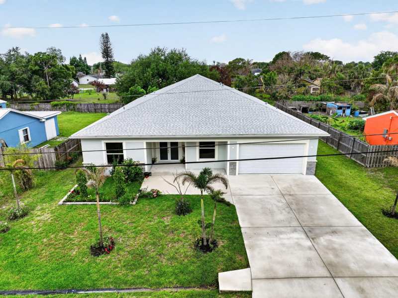 5 bedroom Single Family Residence at 1974 SW Idaho Lane, Port St Lucie Section 8, Port St. Lucie — photo 1