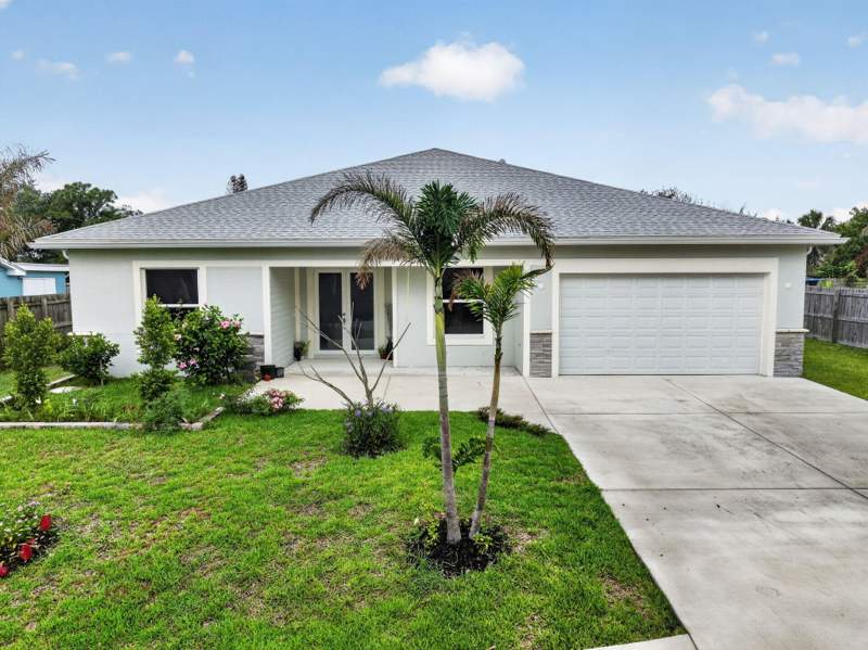 5 bedroom Single Family Residence at 1974 SW Idaho Lane, Port St Lucie Section 8, Port St. Lucie — photo 3