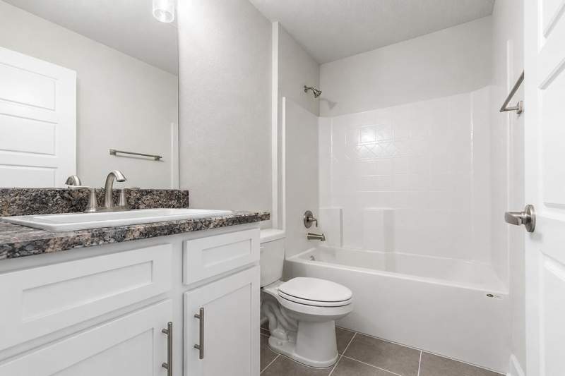 4 bedroom Single Family Residence at 405 NE Airoso Boulevard, Port St Lucie Section 26, Port St. Lucie — photo 5