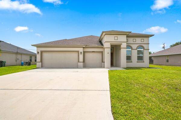 5 bedroom Single Family Residence at 1957 SW Logan Street, Port St Lucie Section 11, Port St. Lucie — photo 2