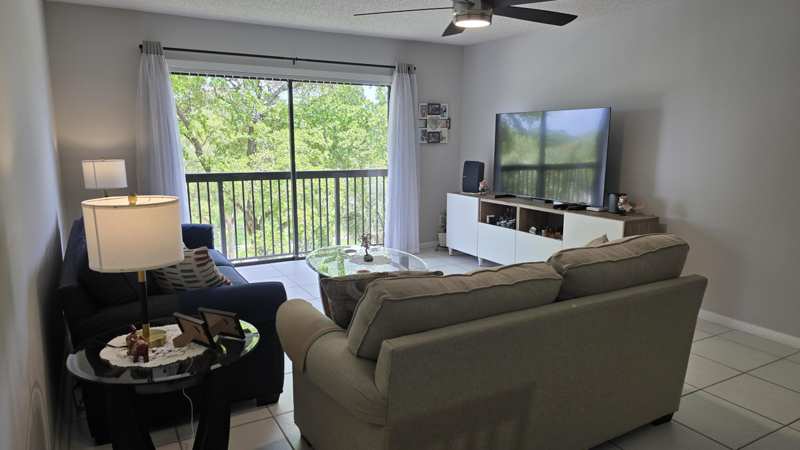 2 bedroom Condominium at 4965 E Sabal Palm Boulevard #403, Lakes Of Carriage Hills, Tamarac — photo 1
