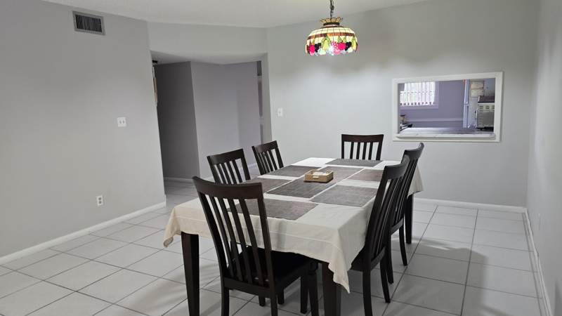 2 bedroom Condominium at 4965 E Sabal Palm Boulevard #403, Lakes Of Carriage Hills, Tamarac — photo 5