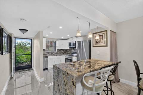 2101 W Woolbright Road #J107, Boynton Beach FL - photo 11 of 47