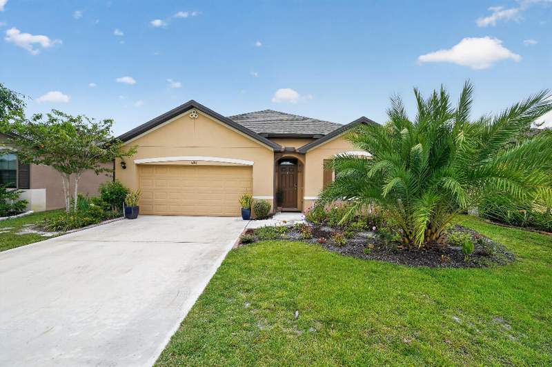 4 bedroom Single Family Residence at 6282 NW Regent Street, THE PRESERVE AT ST. ANDREWS PHASE 2, Port St. Lucie — photo 1