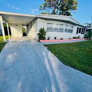 2 bedroom Manufactured Home at 6308 S Ash Lane, Maralago Cay, Lantana — photo 1