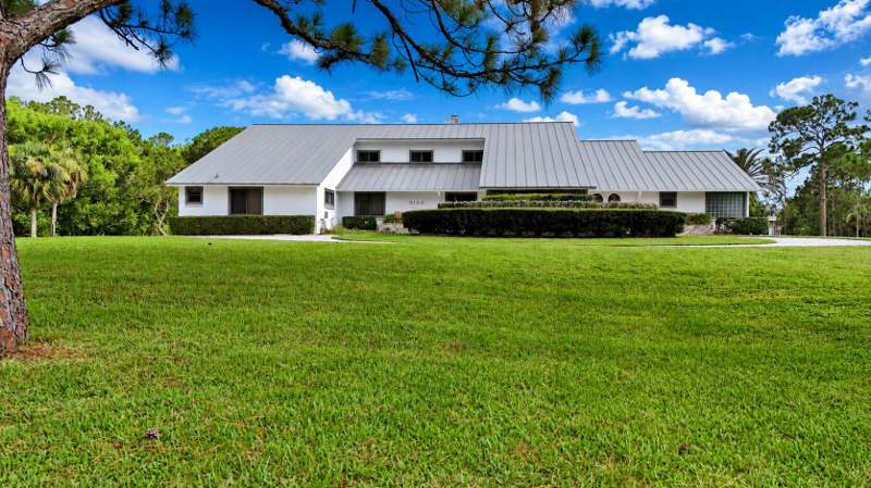 4 bedroom Single Family Residence at 3120 SE Downwinds Road, Colony Park, Jupiter — photo 1