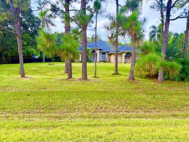 4 bedroom Single Family Residence at 12377 77th Place, Acreage, The Acreage — photo 1