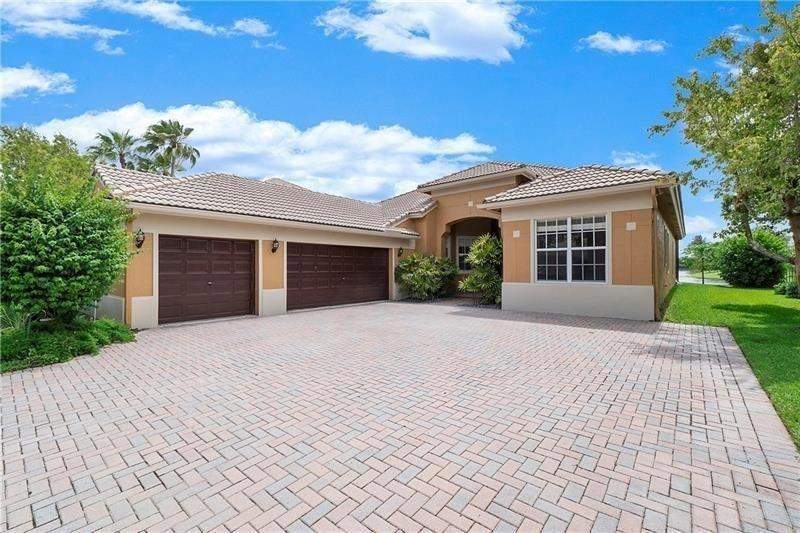 4 bedroom Single Family Residence at 7008 NW 111th Terrace, Parkland Isles, Parkland — photo 2