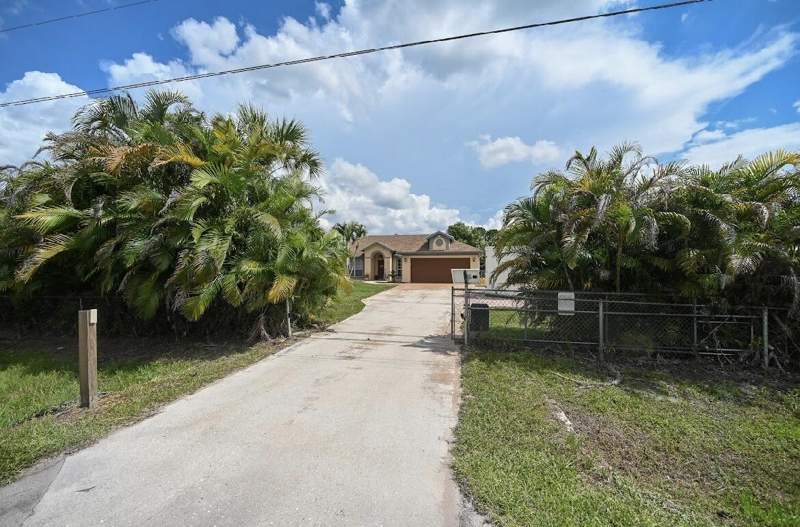 4 bedroom Single Family Residence at 14918 92nd Court, West Palm Beach, West Palm Beach — photo 2