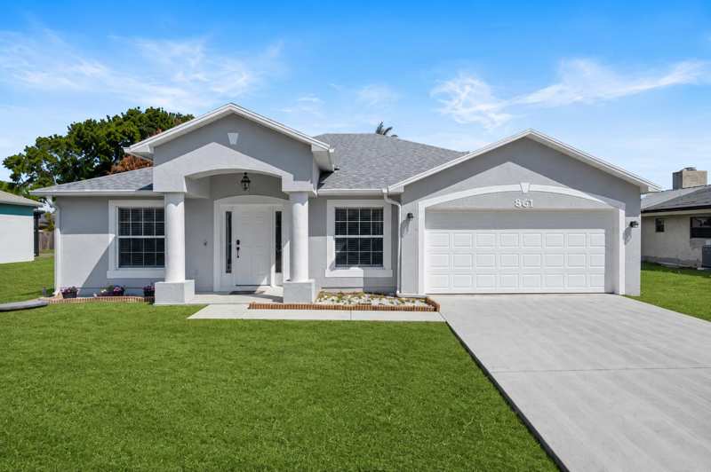 4 bedroom Single Family Residence at 861 SE Cavern Avenue, Port St Lucie Section 3, Port St. Lucie — photo 1