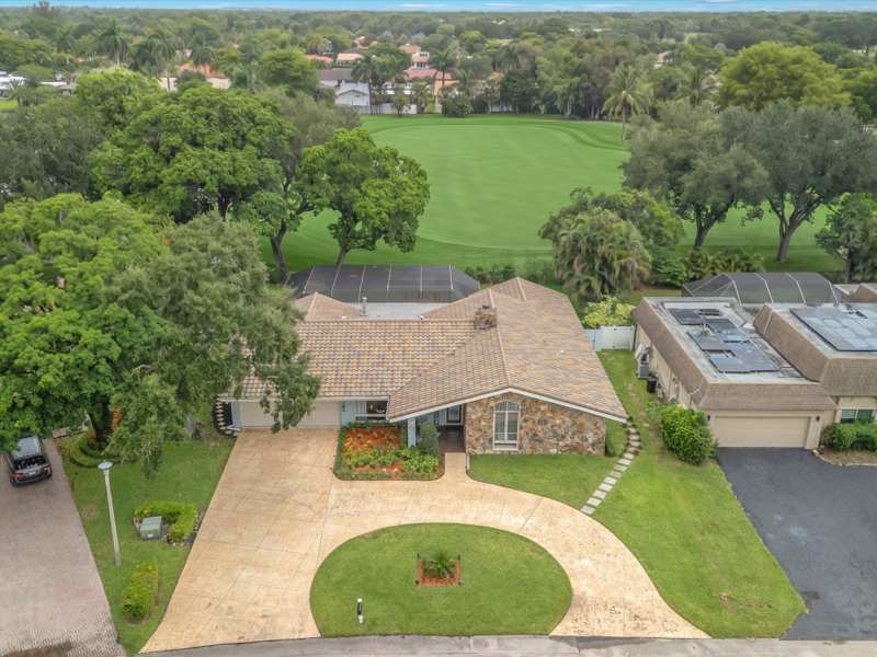 4 bedroom Single Family Residence at 9651 Conch Shell Manor, Jacaranda Country Club West, Plantation — photo 1