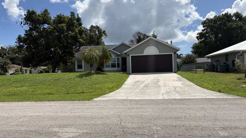 3 bedroom Single Family Residence at 1501 SW Curry Street, Port St Lucie Section 4, Port St. Lucie — photo 1