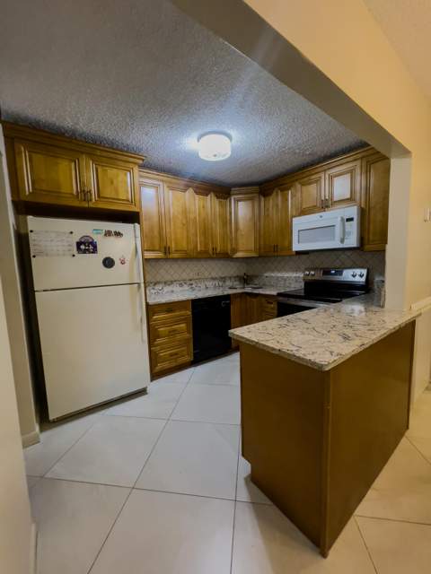 309 Pine Ridge Circle #A-1, Greenacres FL - photo 22 of 25