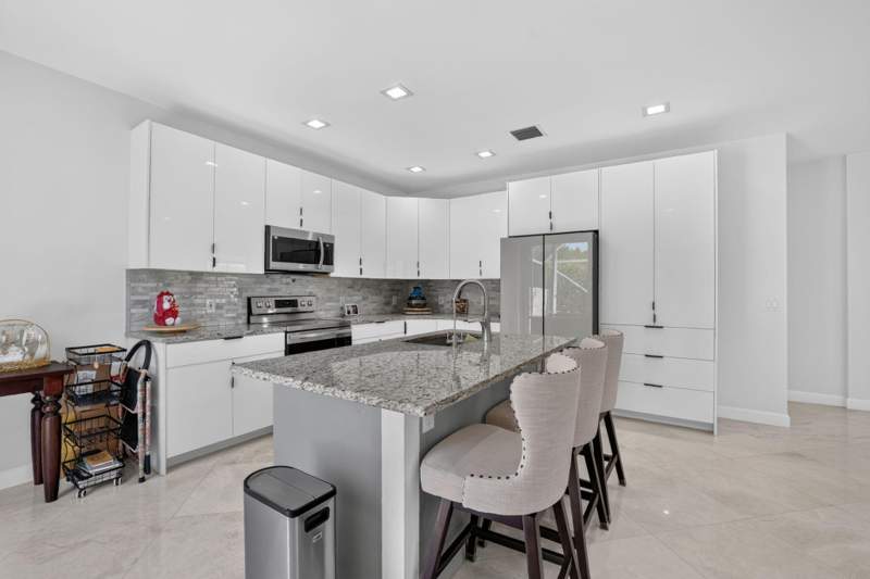 4 bedroom Single Family Residence at 5040 Heron Place, Regency Lakes At Coconut Creek, Coconut Creek — photo 3