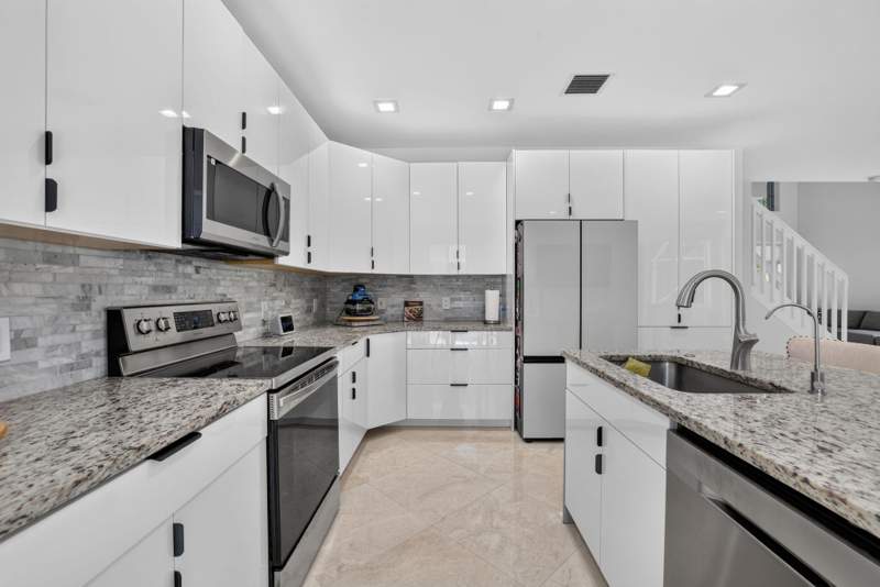 4 bedroom Single Family Residence at 5040 Heron Place, Regency Lakes At Coconut Creek, Coconut Creek — photo 2