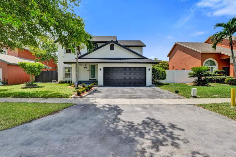 4 bedroom Single Family Residence at 9740 SW 14th Street, Lakeside South, Pembroke Pines — photo 2