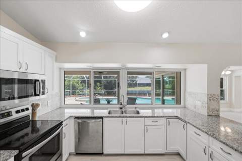 320 NE Surfside Avenue, Port St. Lucie FL - photo 11 of 30