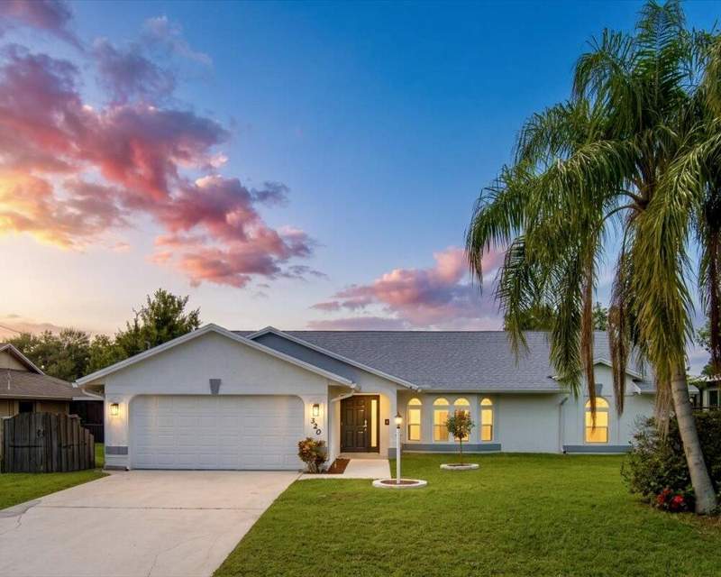 3 bedroom Single Family Residence at 320 NE Surfside Avenue, Port St Lucie Section 26, Port St. Lucie — photo 2