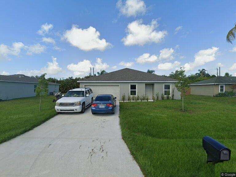 4 bedroom Single Family Residence at 1085 SW Firestone Avenue, Port St Lucie Section 15, Port St. Lucie — photo 1