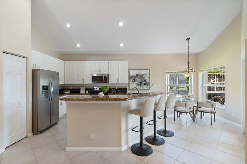 4 bedroom Single Family Residence at 11259 NW 65th Manor, Parkland Isles, Parkland — photo 4