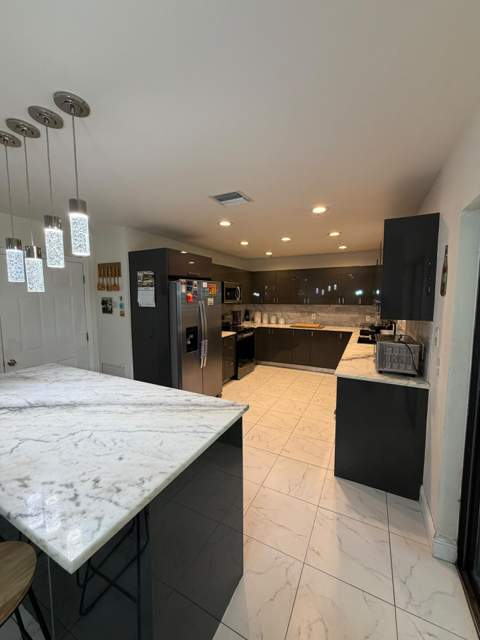 1486 SE Grapeland Avenue, Port St. Lucie FL - photo 6 of 65