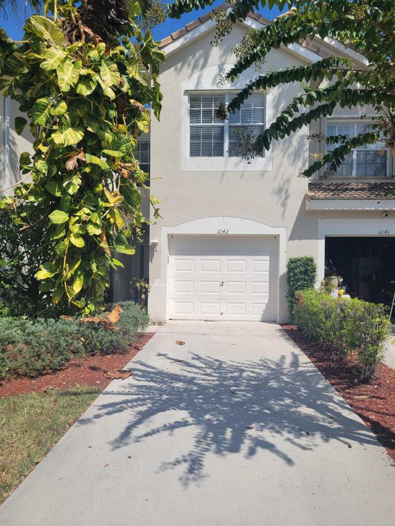 3 bedroom Townhouse at 1042 Woodfield Road, Pine Lake, Greenacres — photo 1
