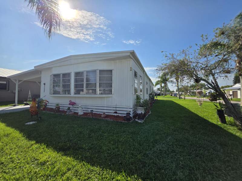 2 bedroom Manufactured Home at 1 Juan Carlos Lane, Spanish Lakes Riverfront, Port St. Lucie — photo 2