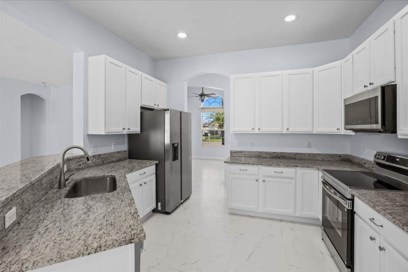 4 bedroom Single Family Residence at 1038 SW Fisherman Avenue, Port St Lucie Section 15, Port St. Lucie — photo 3