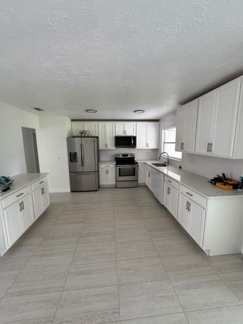 1691 SE Goucho Avenue, Port St. Lucie FL - photo 6 of 55