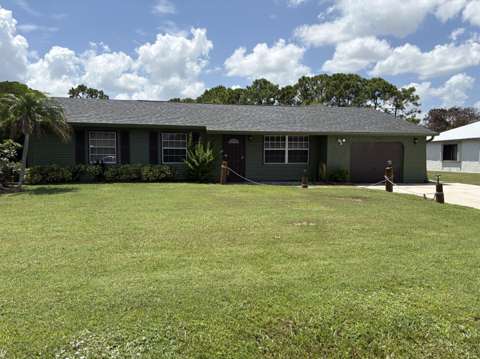 1422 SE Arenson Lane, home for sale in Port St. Lucie 34952