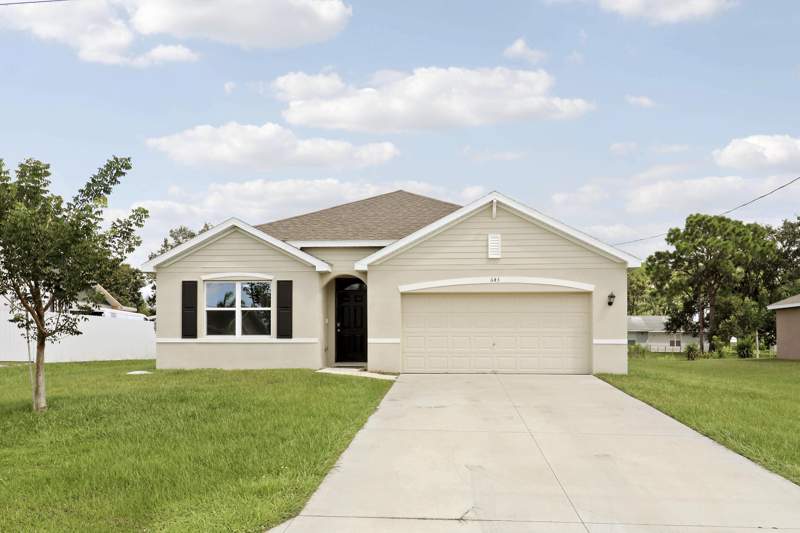 4 bedroom Single Family Residence at 643 NW Riverside Drive, Port St Lucie Section 25, Port St. Lucie — photo 2