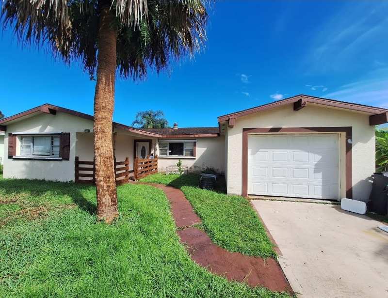 2 bedroom Single Family Residence at 115 SE Camino Street, River Park Unit 3, Port St. Lucie — photo 1