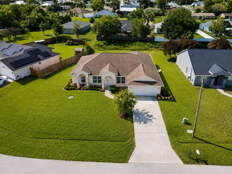 4 bedroom Single Family Residence at 1061 SW Coleman Avenue, Port St Lucie Section 8, Port St. Lucie — photo 1