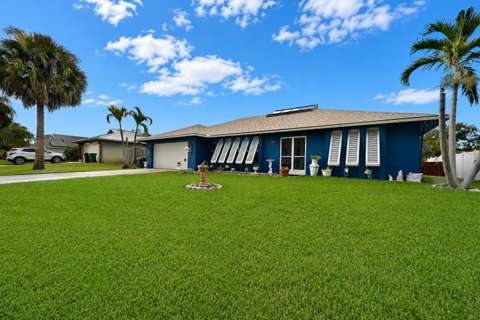1229 SW Cynthia Street, home for sale in Port St. Lucie 34983
