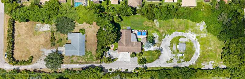 4 bedroom Single Family Residence at 5681 Desoto Road, S/D Of 36-44-42, SW 1/4, Greenacres — photo 2