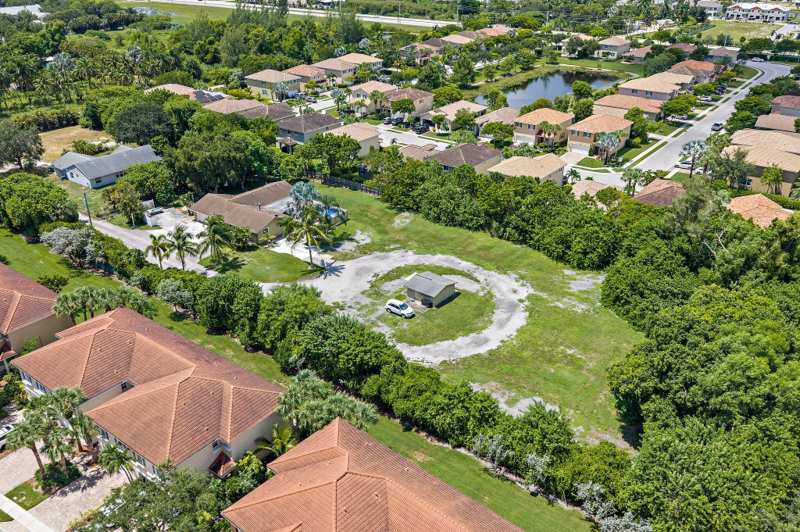 4 bedroom Single Family Residence at 5681 Desoto Road, S/D Of 36-44-42, SW 1/4, Greenacres — photo 1